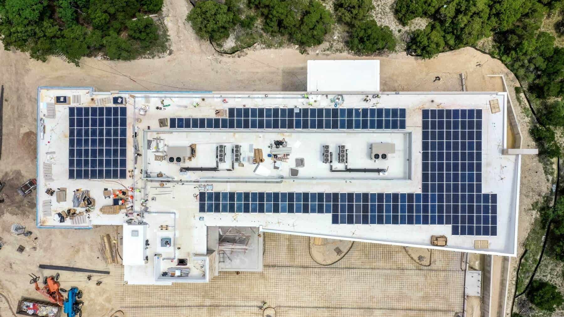 Solar panel installation on rooftop of Davenport 360 in Austin, Texas