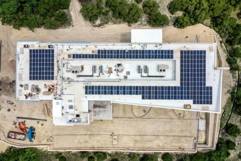 Overhead drone shot of commercial building roof