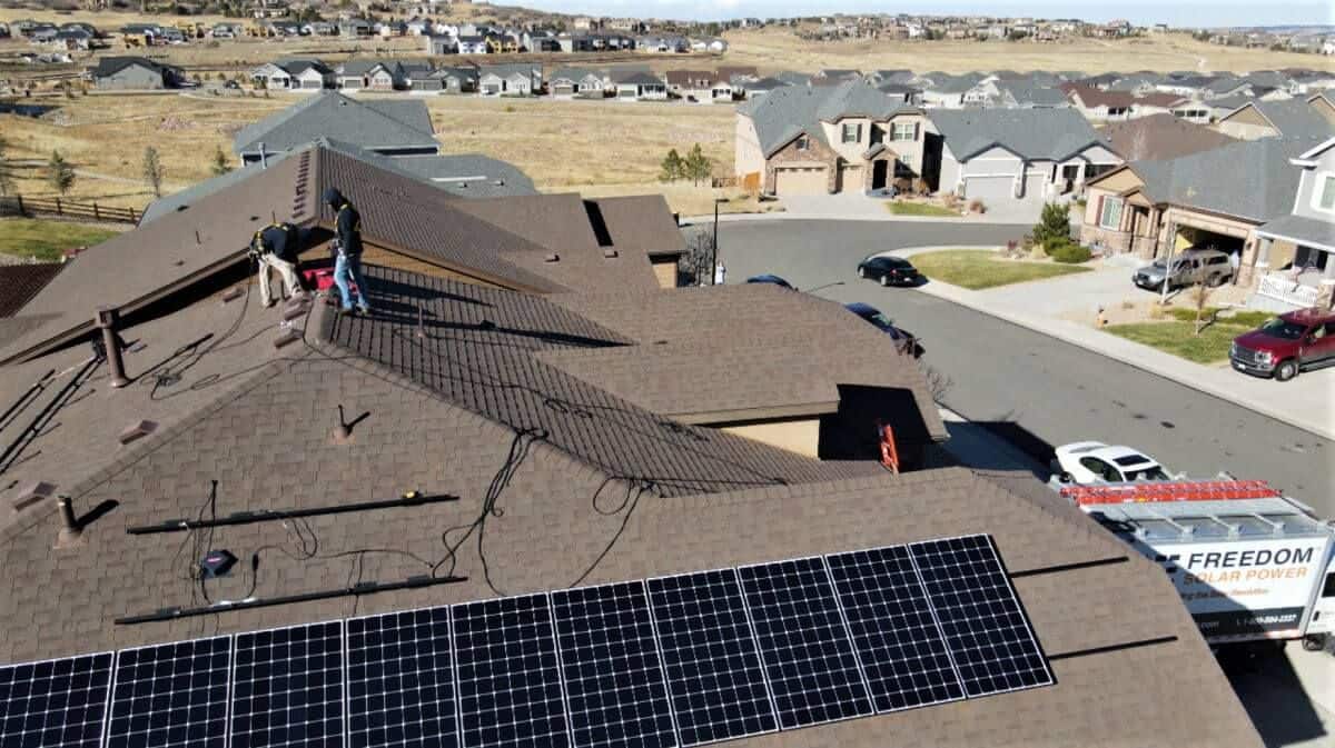 Freedom Solar's team during installation of solar panels on the roof of home in Colorado Springs