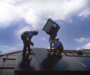 Freedom Solar's team installing solar panels on roof in Colorado