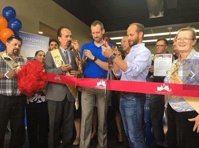Freedom Solar's CEO, Bret Biggart and team members at the ribbon cutting ceremony of a new office in San Antonio, Texas