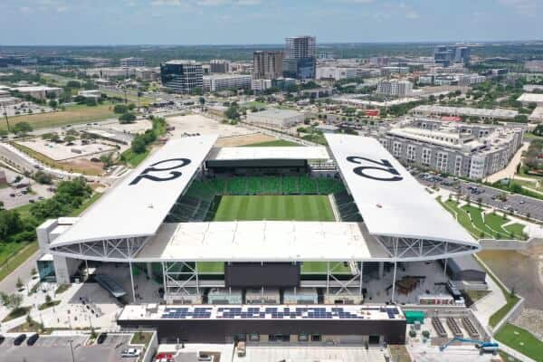 Aerial view of Q2 stadium in Austin, Texas with solar panels installed on the roof