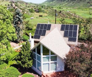 Large home with solar panels installed on the roof