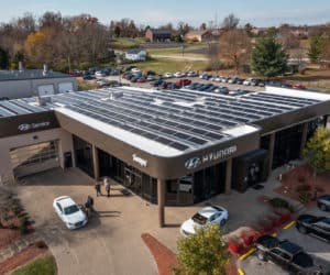 Auto dealership with solar panels on roof