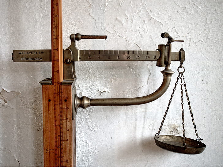Photo of an old fashioned scale weight for objects