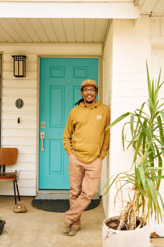 Alvin Dedeaux at Front Door of Home
