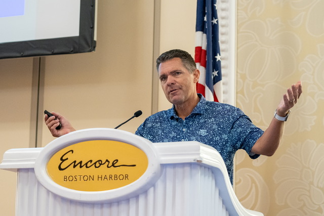 Ryan Ferrero speaking at Encore Boston Harbor podium