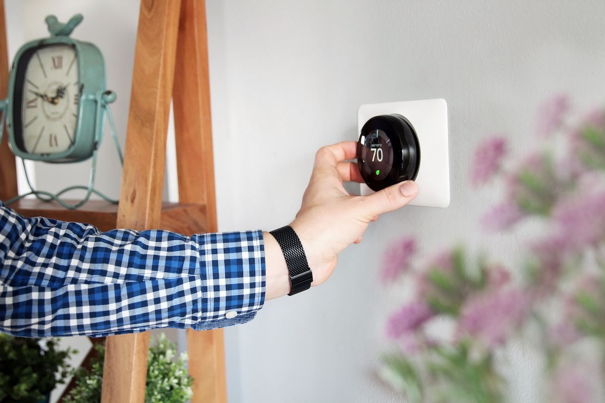 Adjusting HVAC Thermometer copy - HVAC Services in Austin, TX